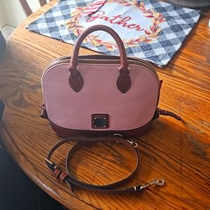 Dooney and Bourke small pink  purse. Over the body strap included.